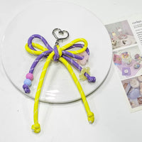 KCB77B | Ribbon Keychain 1pcs 1$ - purple yellow