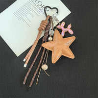 KCB79B | Brown Star Keychain 1pcs2.25$